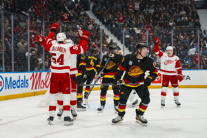 Oct 22, 2026; Vancouver, British Columbia, CAN; Detroit Red Wings defenseman William Wallinder (54) celebrates his goal with defenseman Justin Faulk (72) in the first period against the Vancouver Canucks at Rogers Arena. Mandatory Credit: Bob Frid-Imagn Images